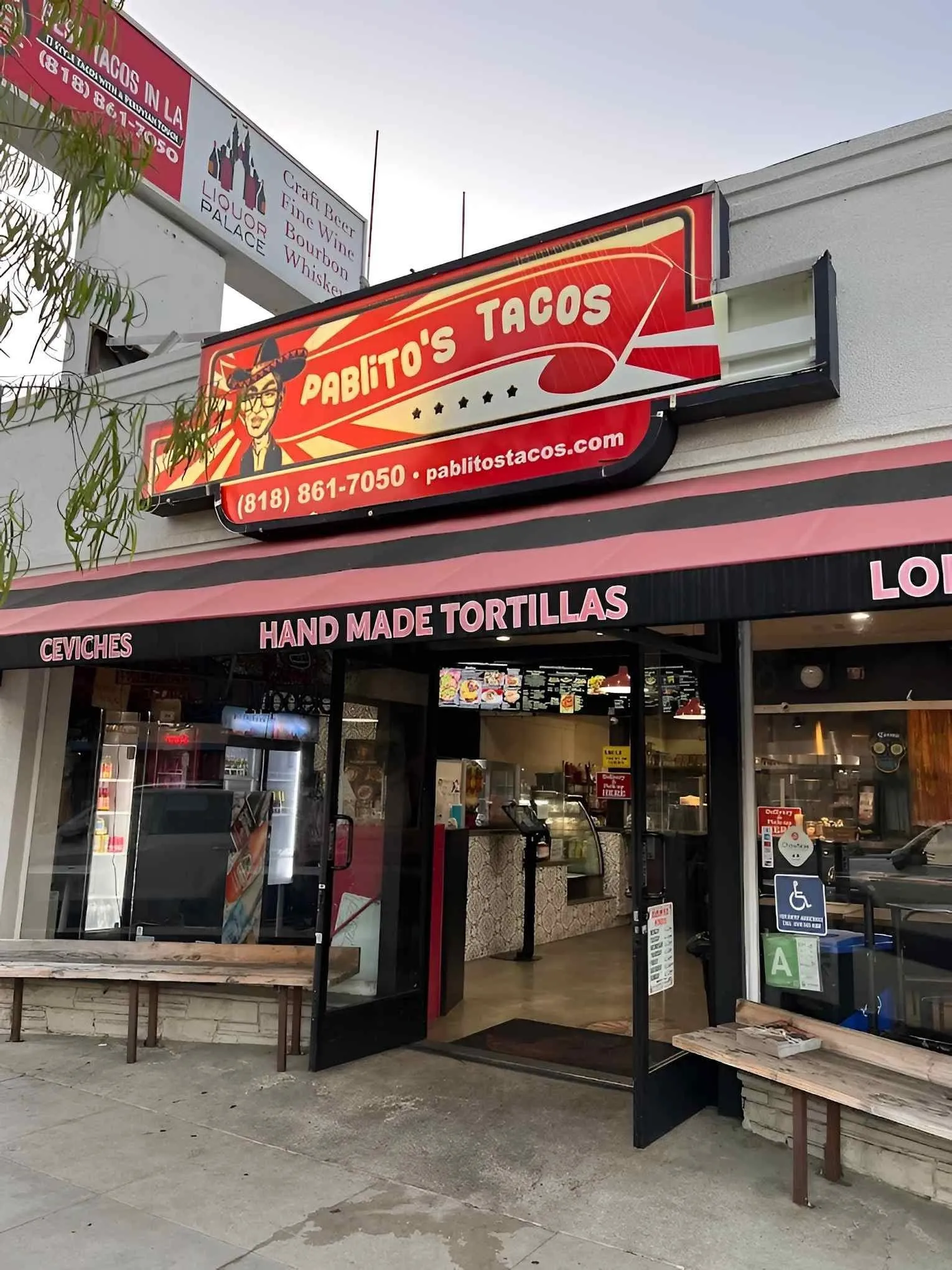 Pablito's Tacos storefront on West Burbank Blvd with the red sunburst sign