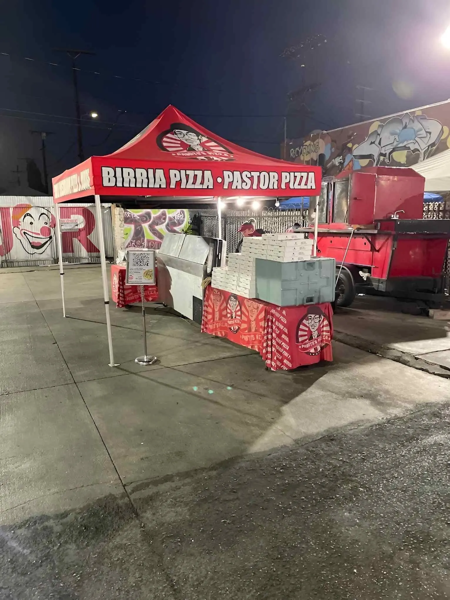Pablito's red tents and grills at the North Hollywood taco stand