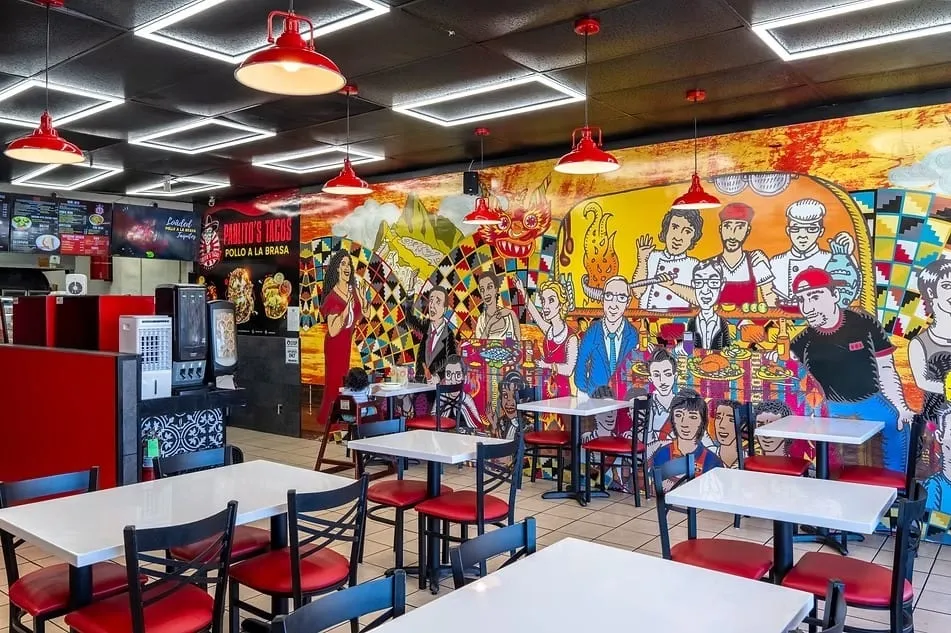 Inside Pablito's Tacos Van Nuys with its hand-painted mural